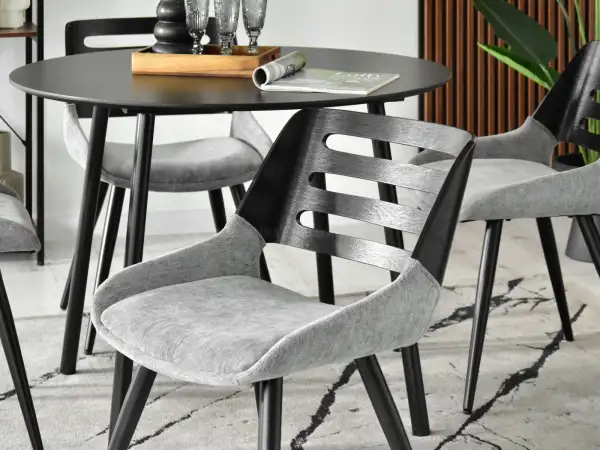 Krzesło tapicerowane tkaniną : stylowe i wygodne wzornictwo do różnych przestrzeni